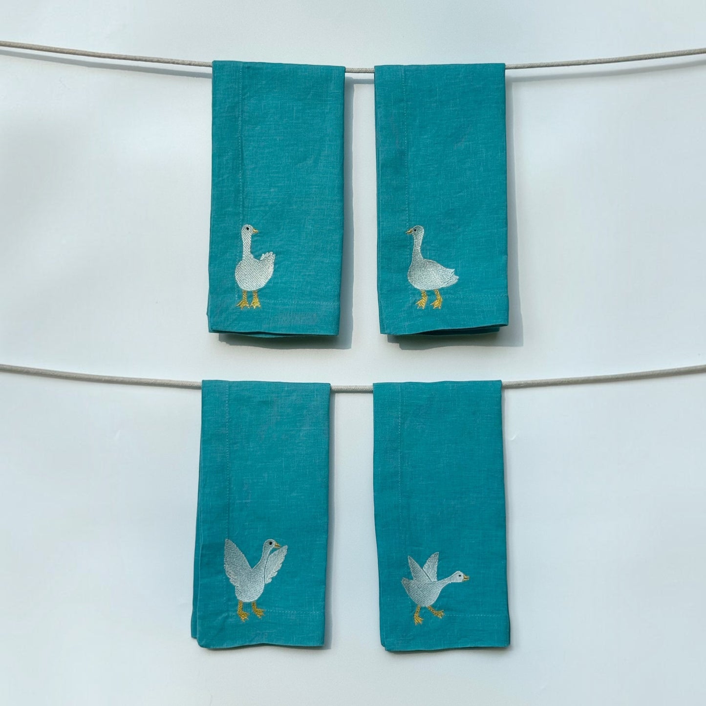Blue Linen Napkins with Embroidered Geese — Set of 4