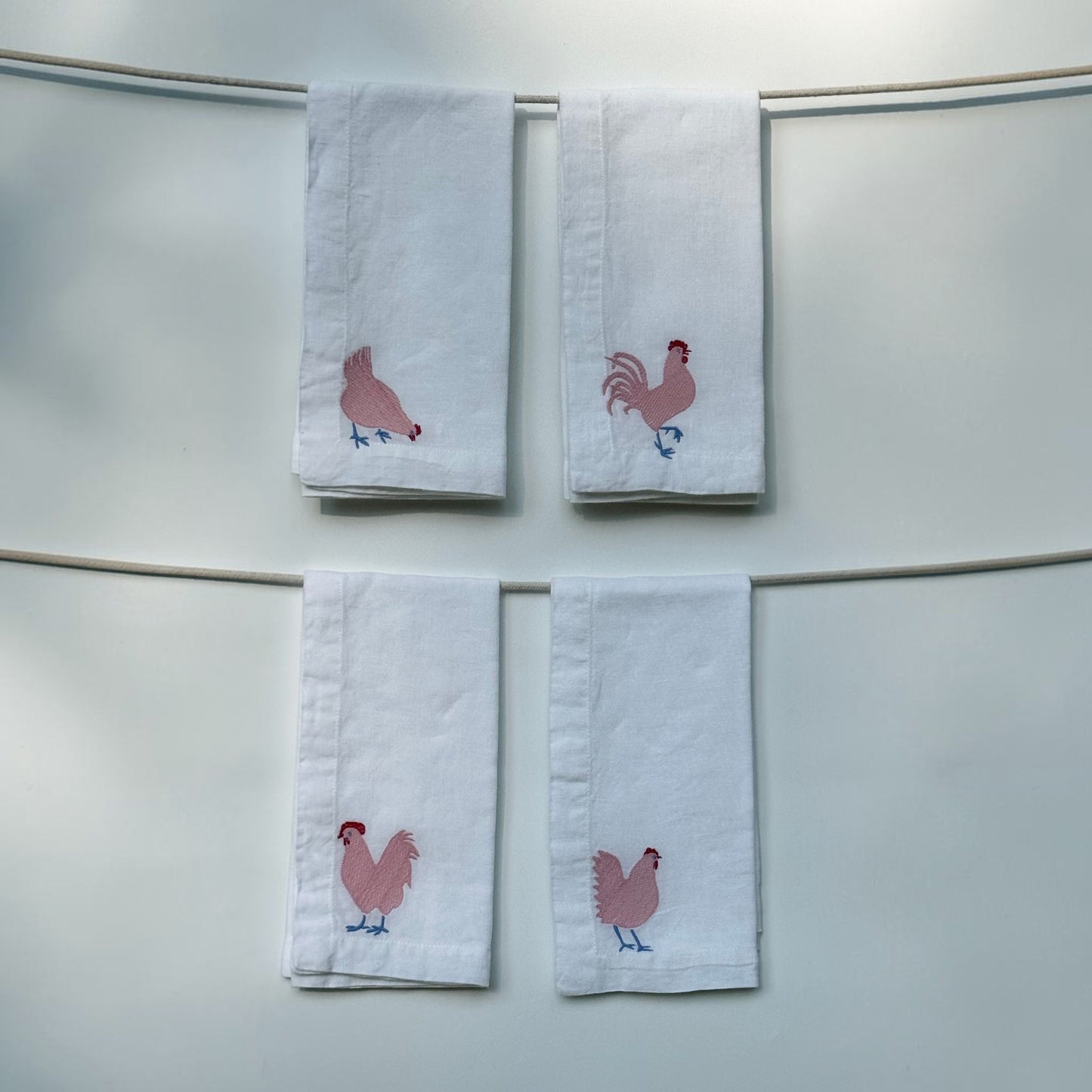 White Linen Napkins with Embroidered Chickens — Set of 4