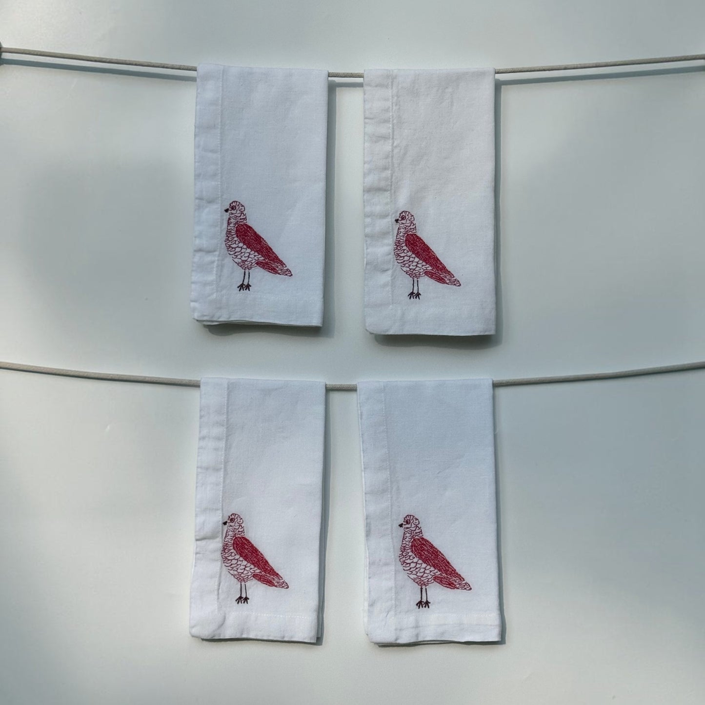 White Linen Napkins with Embroidered Pigeons — Set of 4